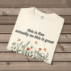 unisex graphic t-shirt with "Skeleton in Wildflower Field" design