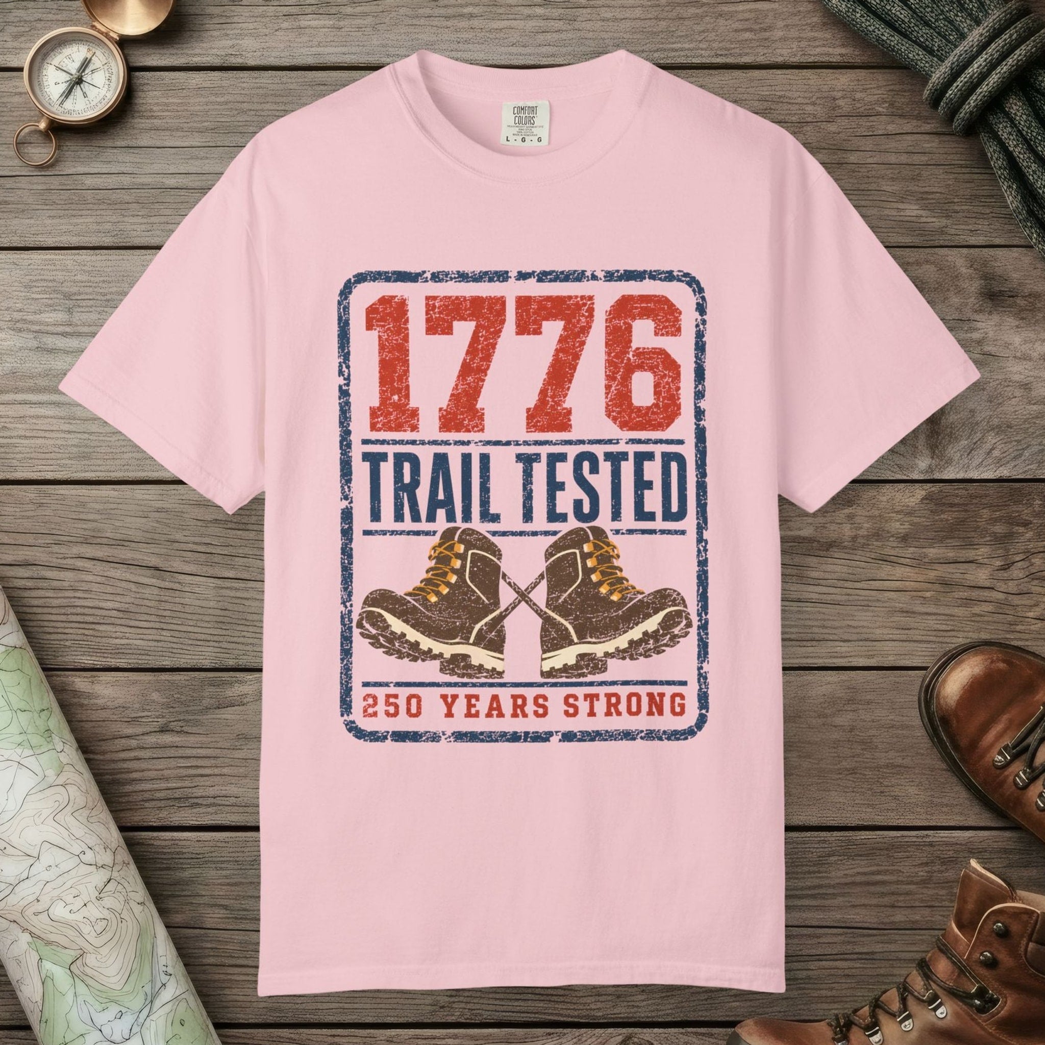 Blossom color unisex graphic t-shirt with "1776 Trail Tested" design