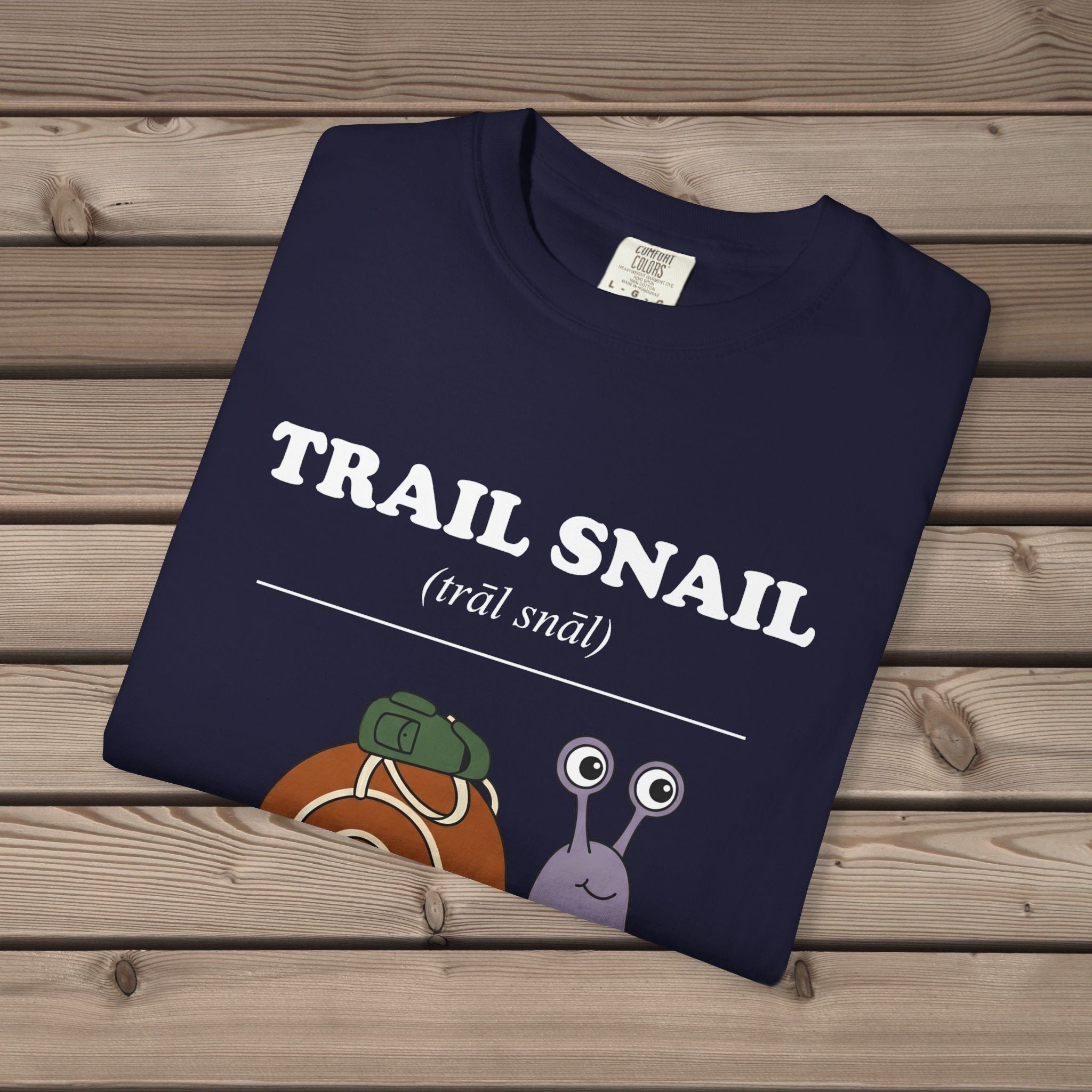 unisex graphic t-shirt with "Trail Snail Definition" design