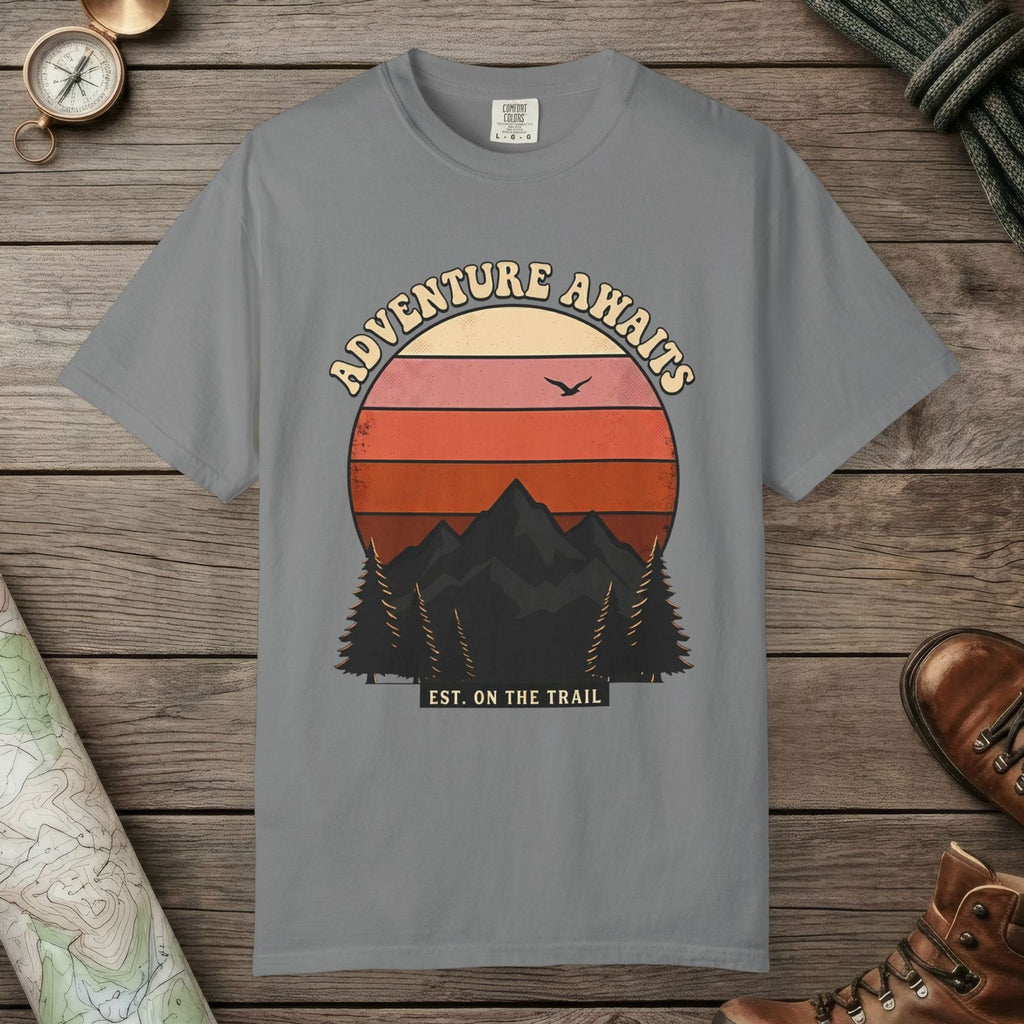 Grey color unisex graphic t-shirt with "Adventure Awaits Retro Sunset" design