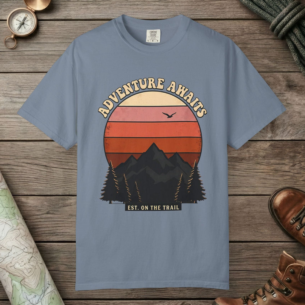 Blue Jean color unisex graphic t-shirt with "Adventure Awaits Retro Sunset" design