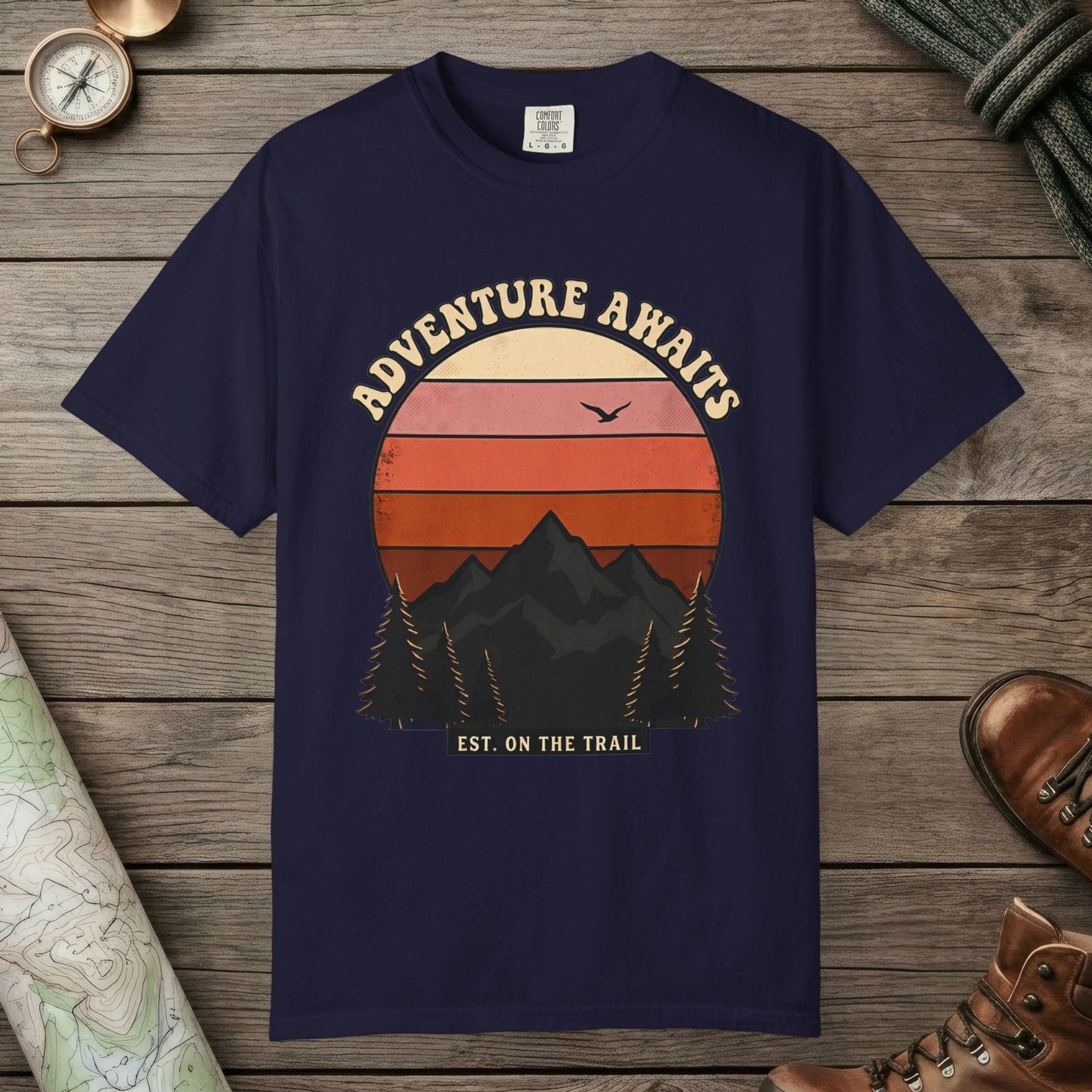 True Navy color unisex graphic t-shirt with "Adventure Awaits Retro Sunset" design