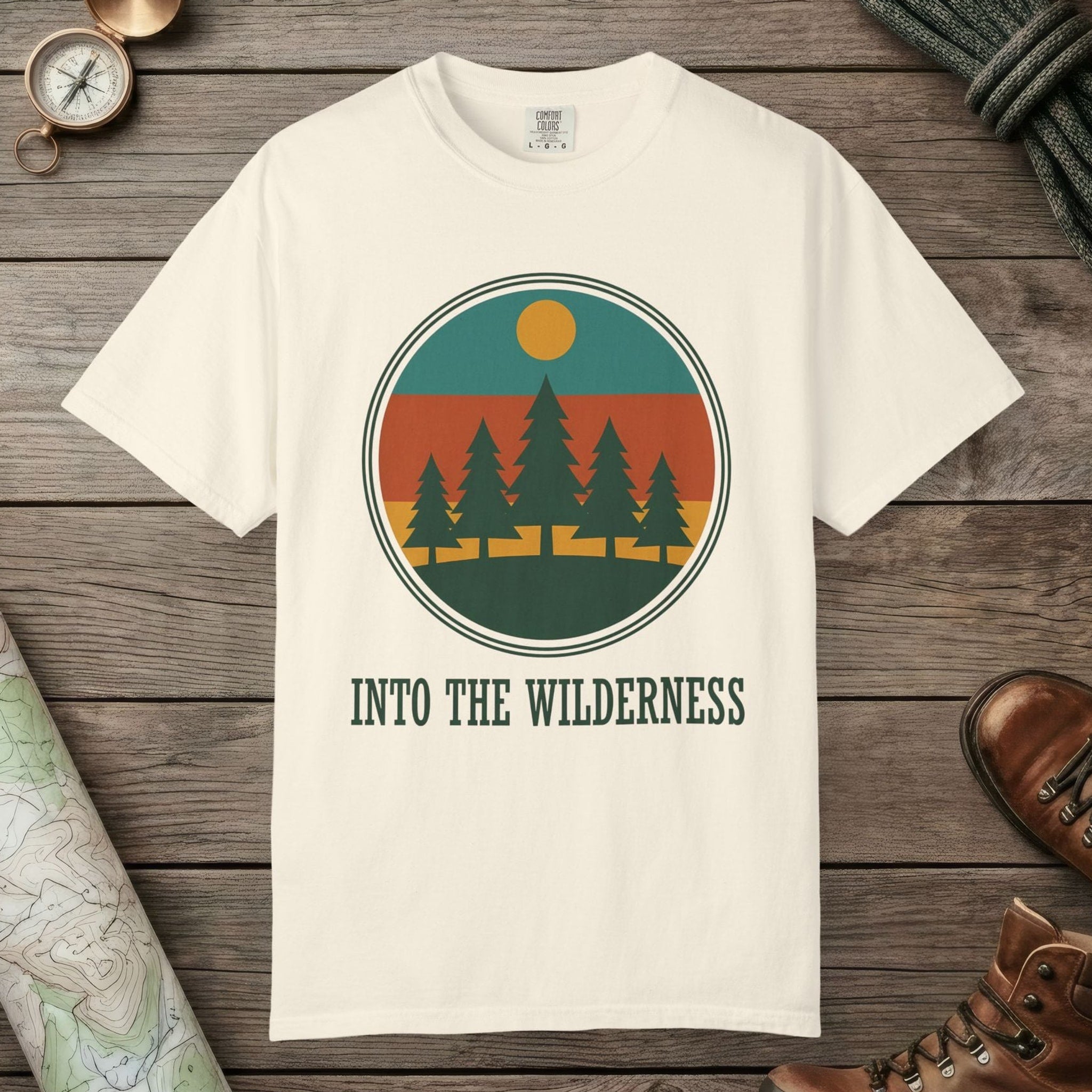 Ivory color unisex graphic t-shirt with "Alpine Pine Sunset" design