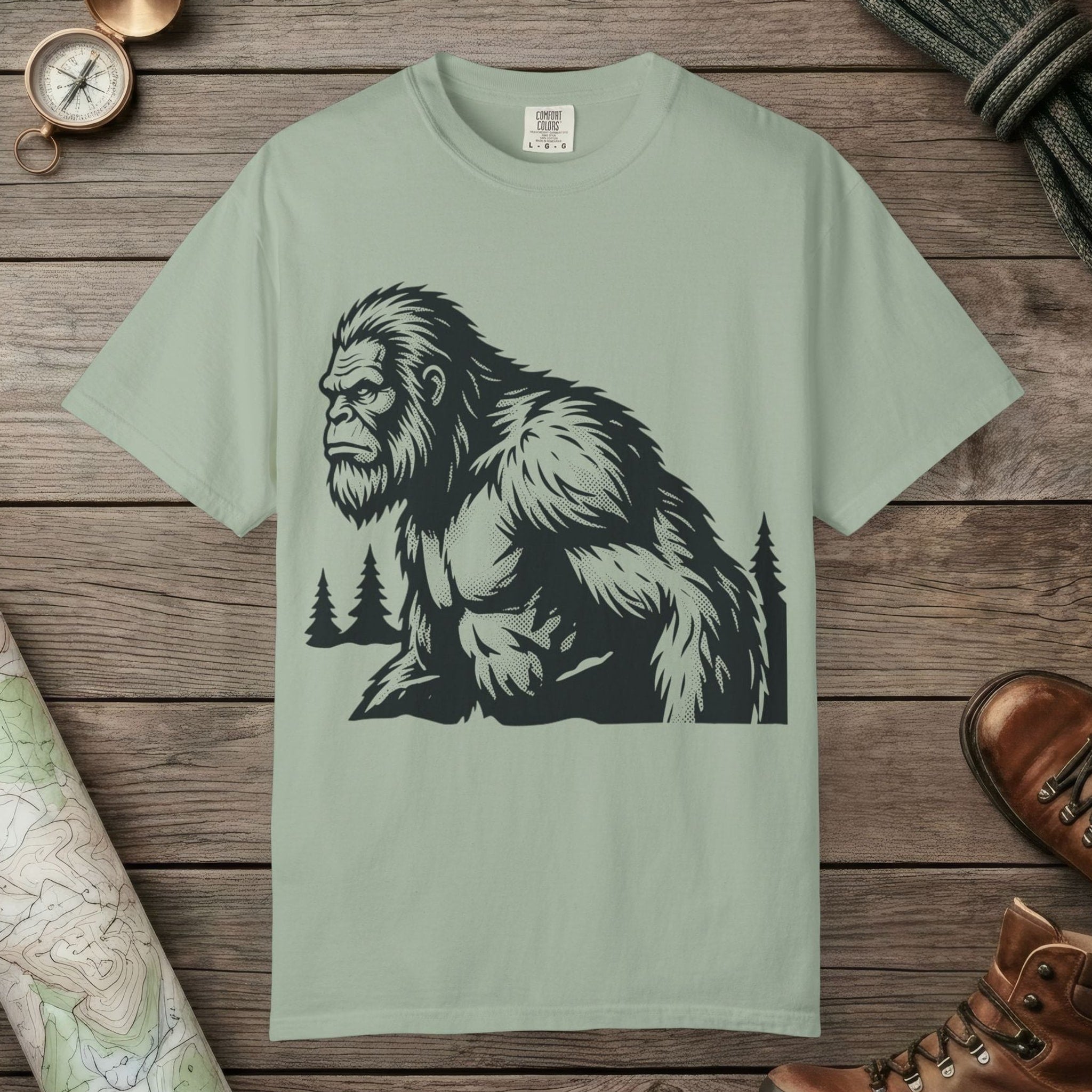 Bay color unisex graphic t-shirt with "Angry Sasquatch" design
