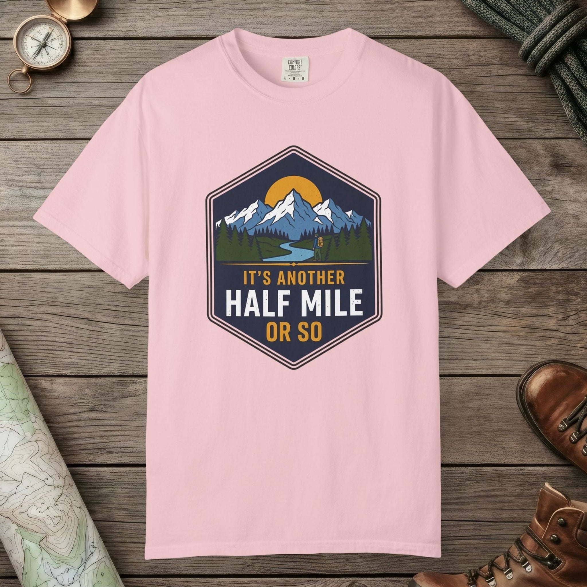 Blossom color unisex graphic t-shirt with "Another Half Mile" design
