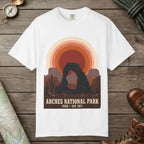 White color unisex graphic t-shirt with "Arches National Park Retro Sunset" design