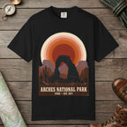 Black color unisex graphic t-shirt with "Arches National Park Retro Sunset" design