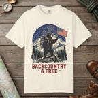 Ivory color unisex graphic t-shirt with "Backcountry And Free" design