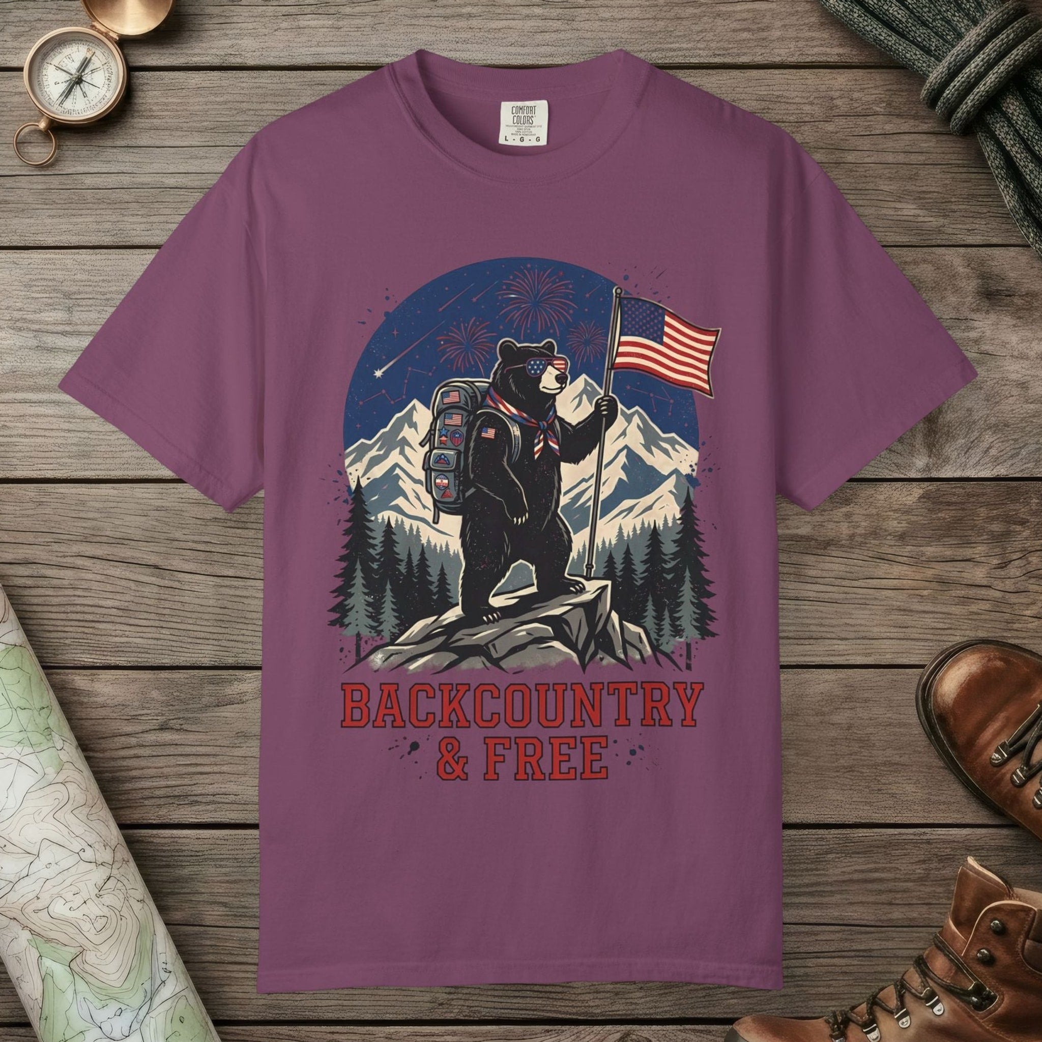 Berry color unisex graphic t-shirt with "Backcountry And Free" design