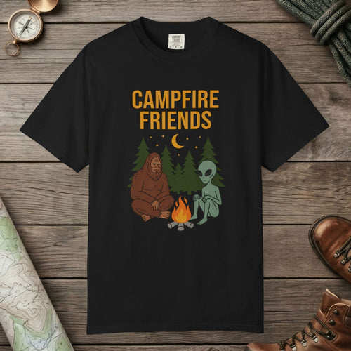 Black color unisex graphic t-shirt with "Bigfoot And Alien Campfire" design