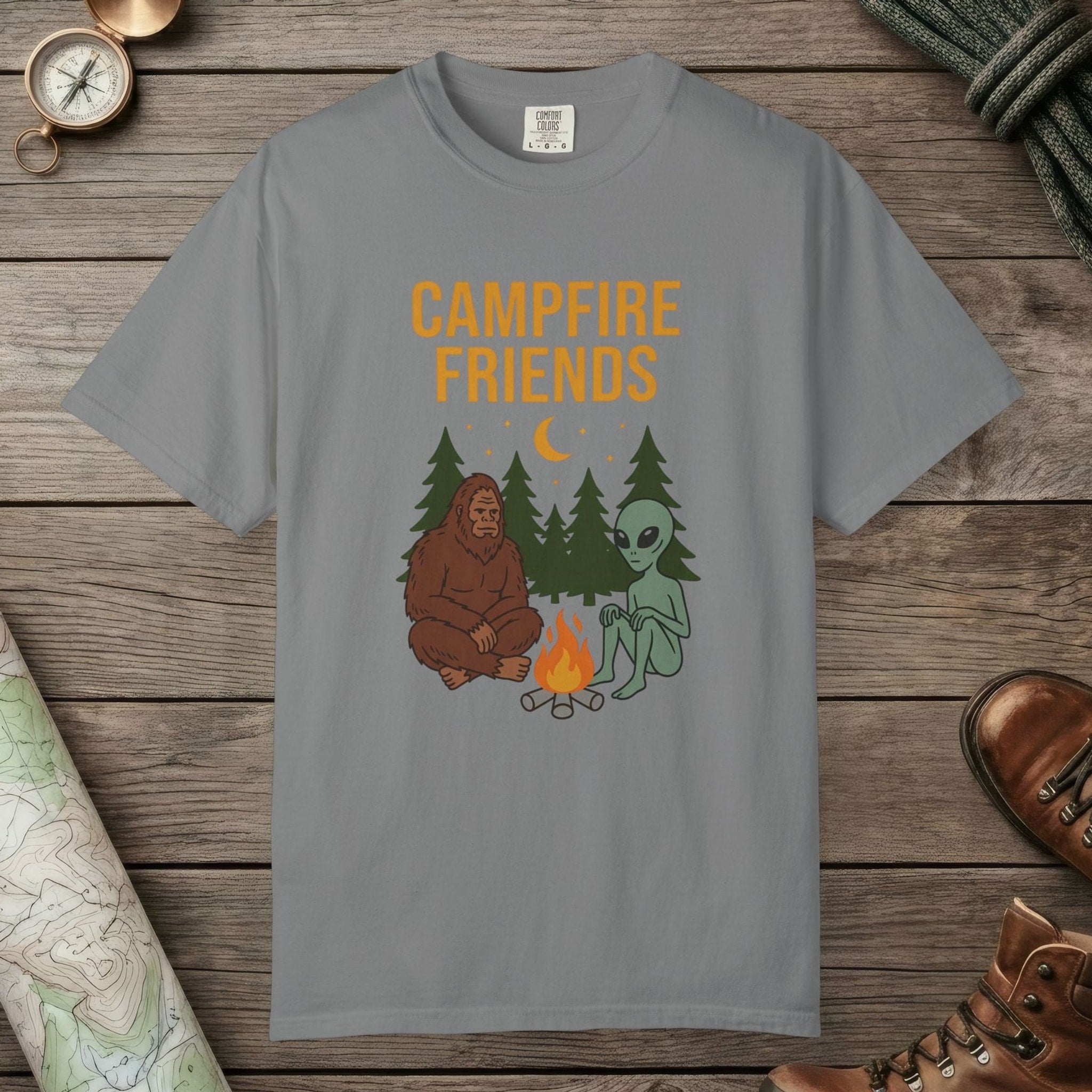 Grey color unisex graphic t-shirt with "Bigfoot And Alien Campfire" design