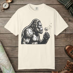 Ivory color unisex graphic t-shirt with "Bigfoot Blowing Wishes" design