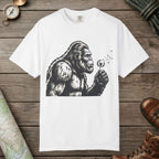 White color unisex graphic t-shirt with "Bigfoot Blowing Wishes" design