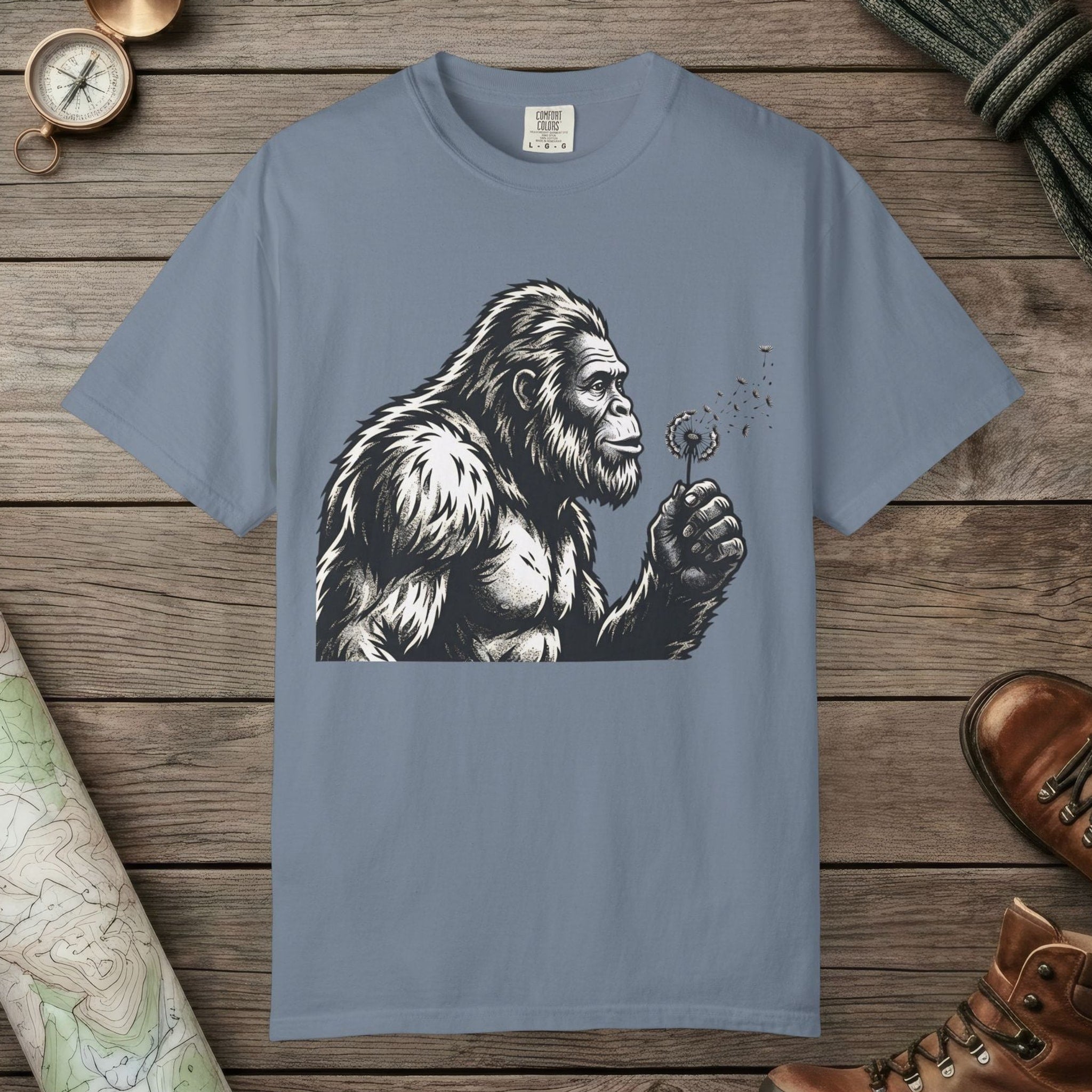 Blue Jean color unisex graphic t-shirt with "Bigfoot Blowing Wishes" design
