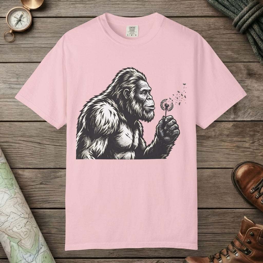 Blossom color unisex graphic t-shirt with "Bigfoot Blowing Wishes" design