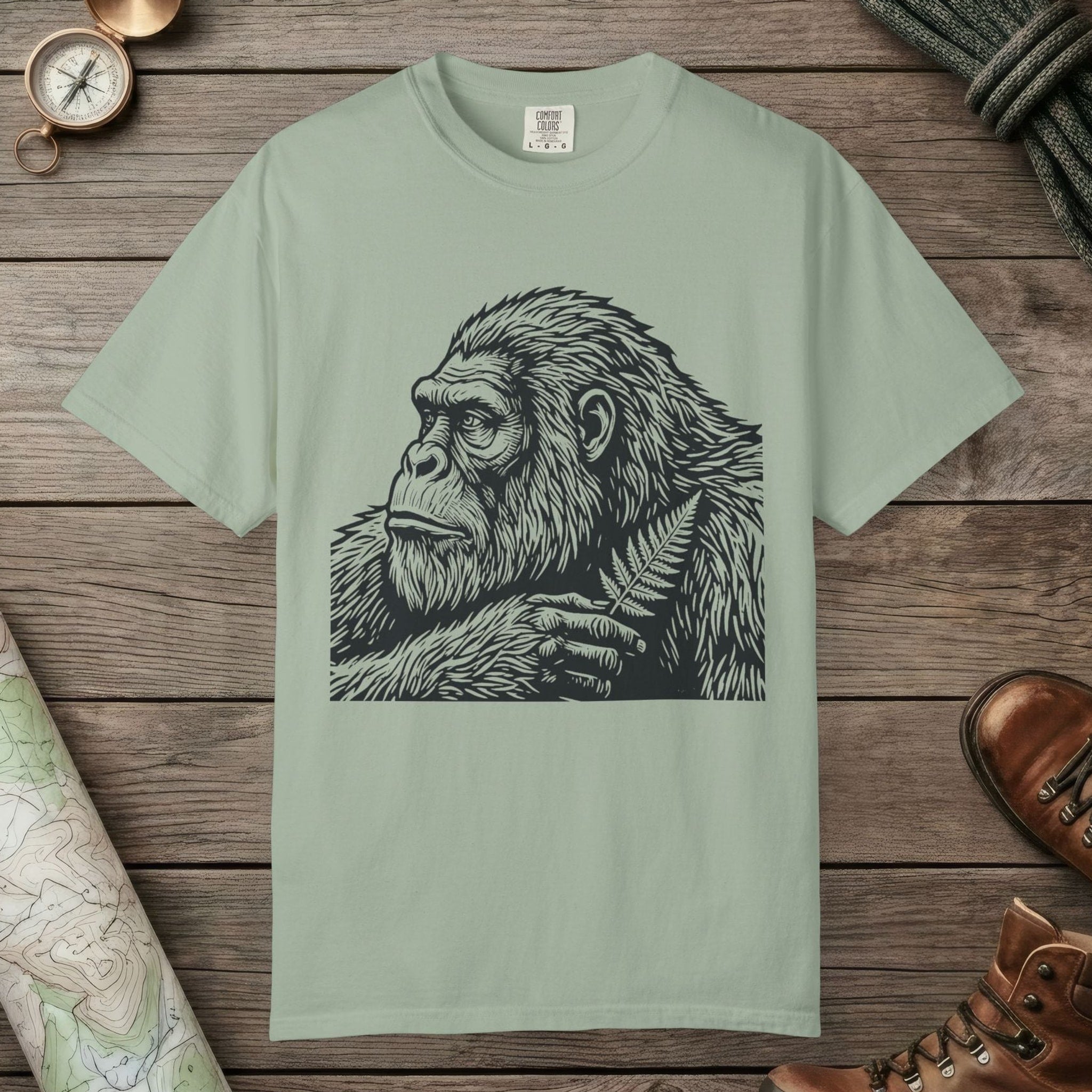 Bay color unisex graphic t-shirt with "Bigfoot Thinking" design