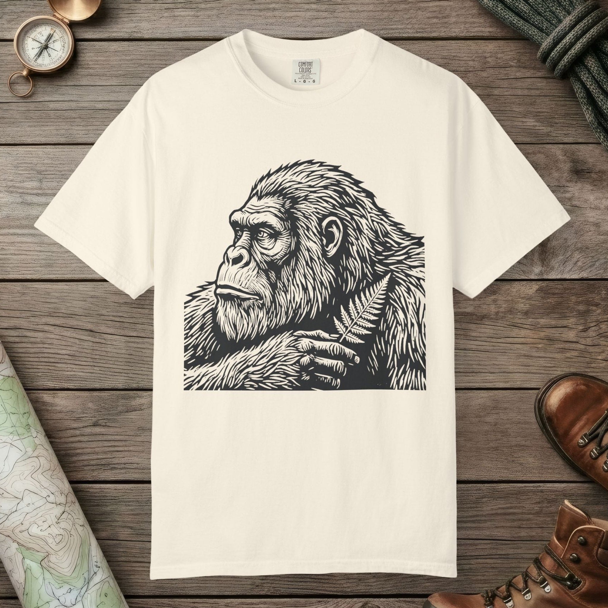 Ivory color unisex graphic t-shirt with "Bigfoot Thinking" design