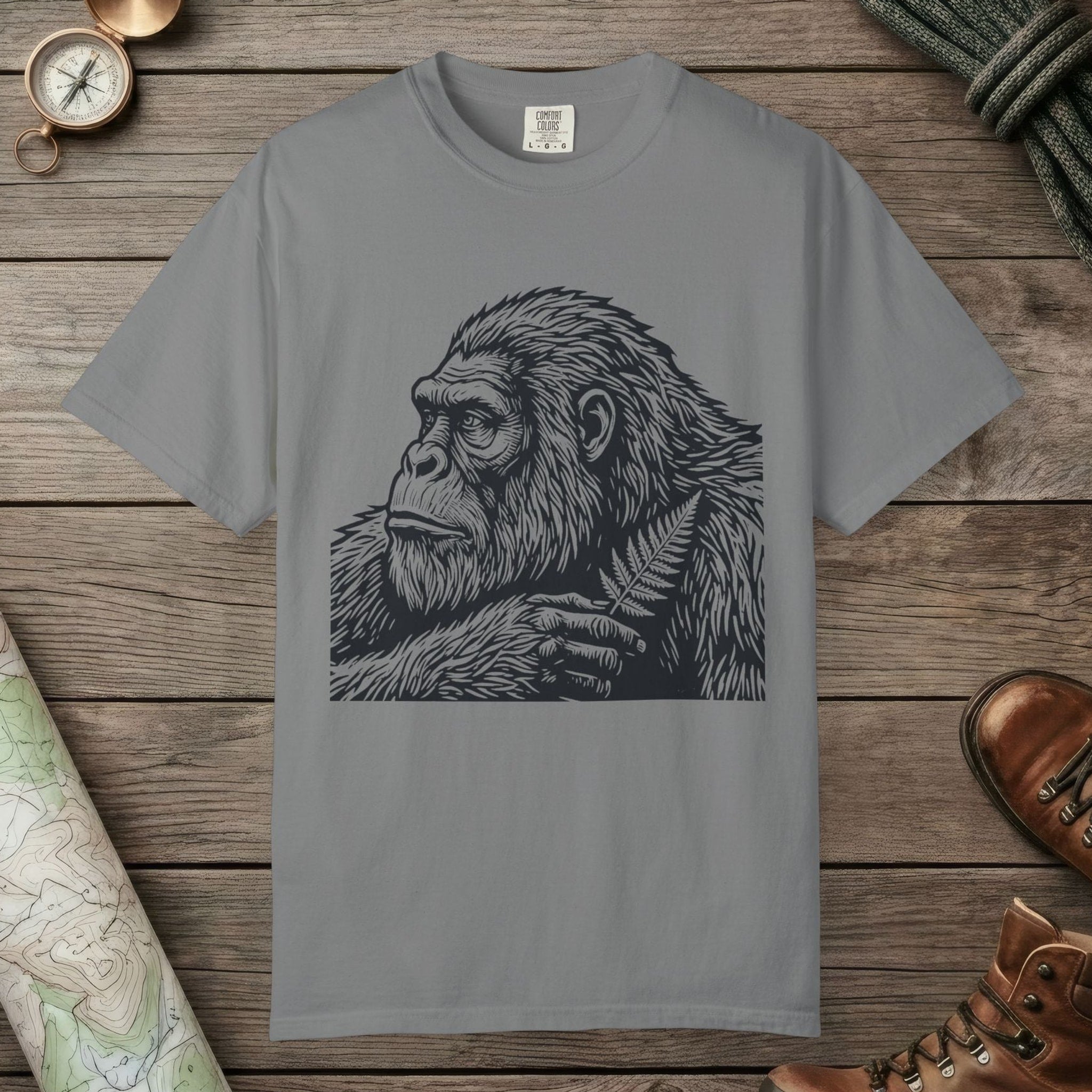 Grey color unisex graphic t-shirt with "Bigfoot Thinking" design