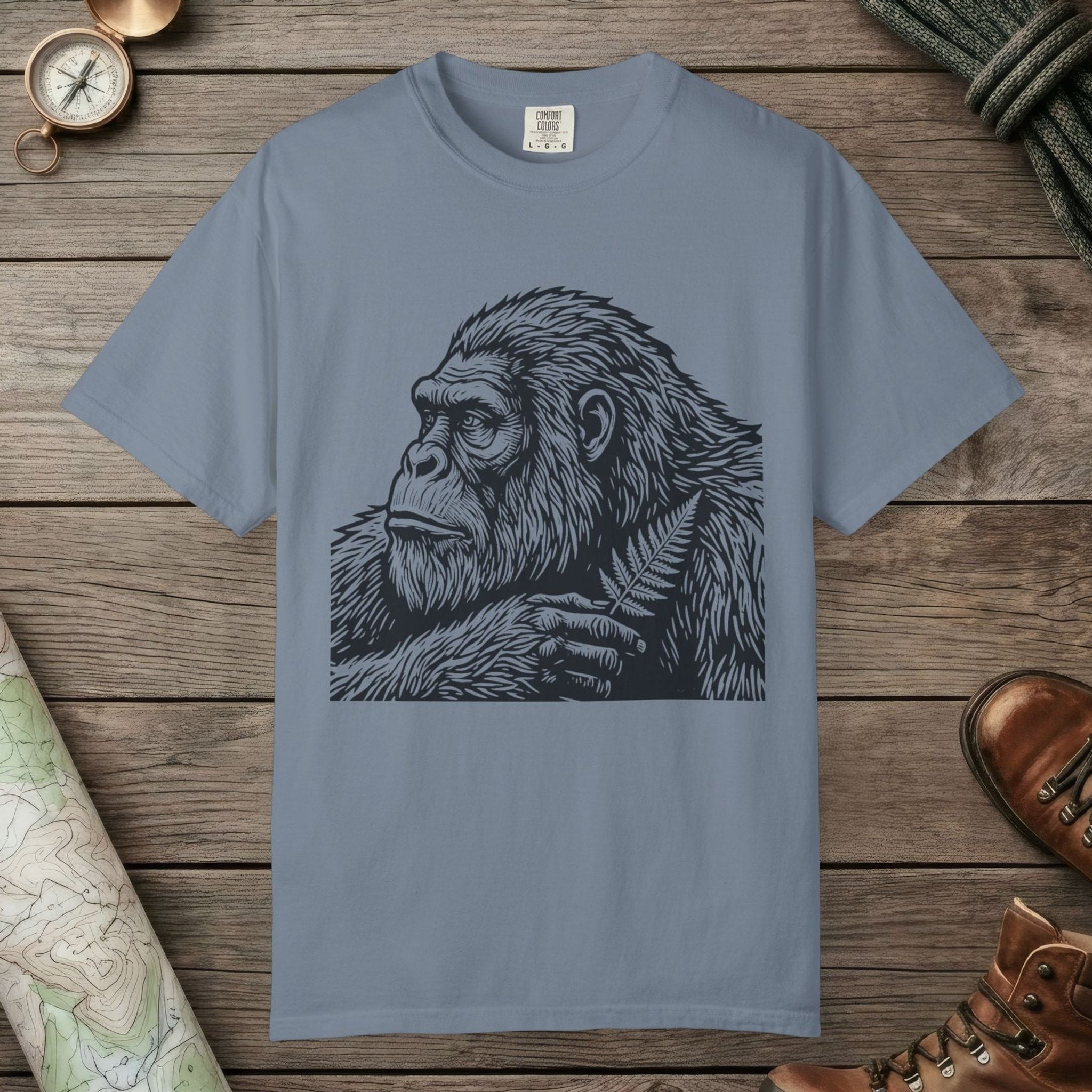 Blue Jean color unisex graphic t-shirt with "Bigfoot Thinking" design