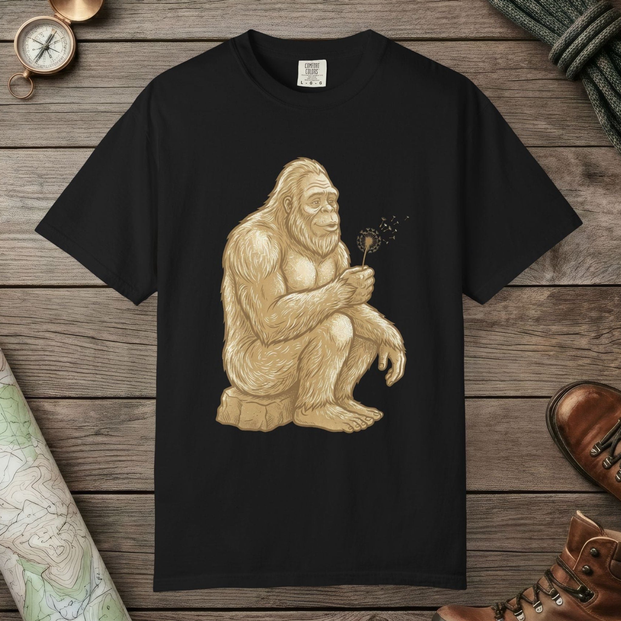 Black color unisex graphic t-shirt with "Bigfoot Wishes" design