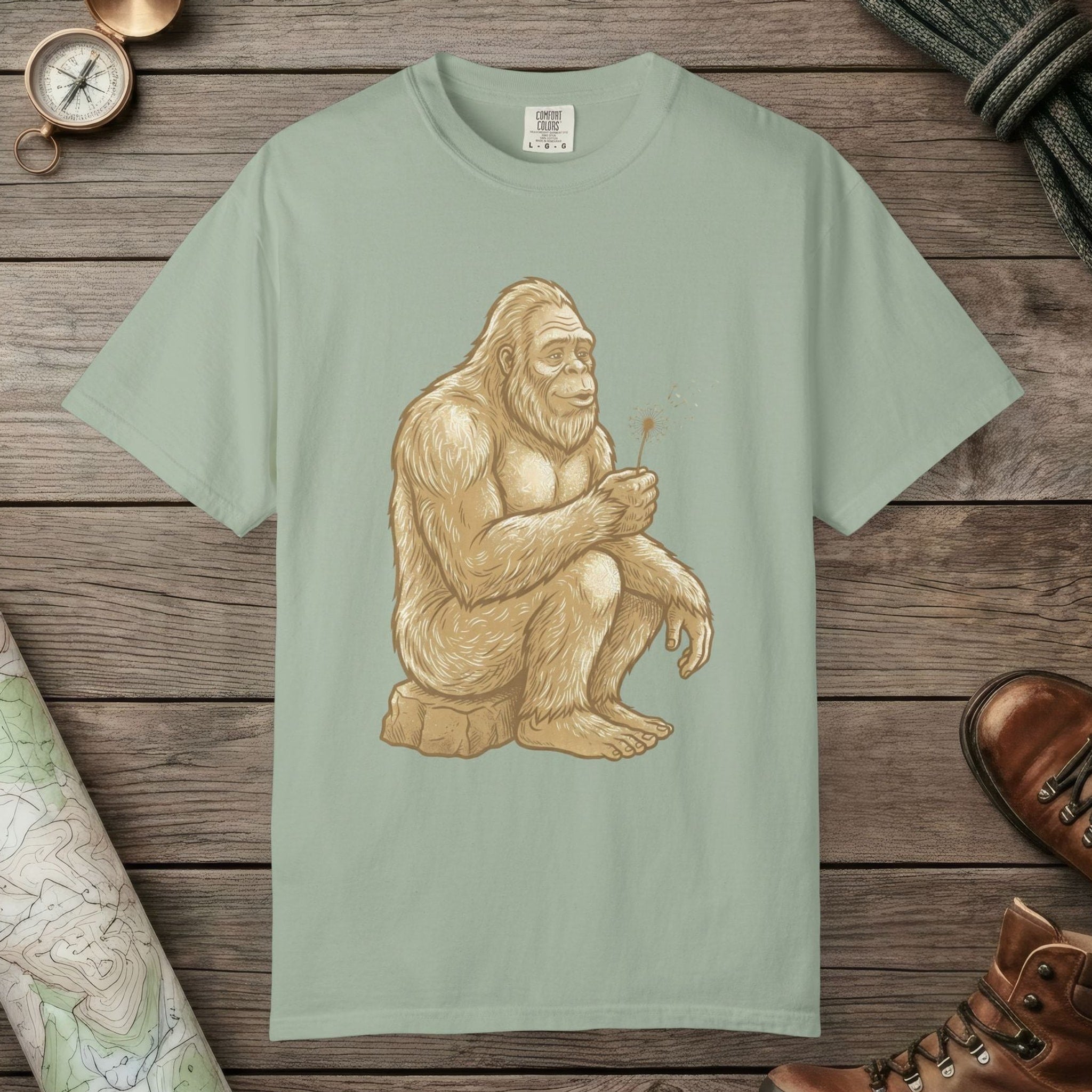 Bay color unisex graphic t-shirt with "Bigfoot Wishes" design