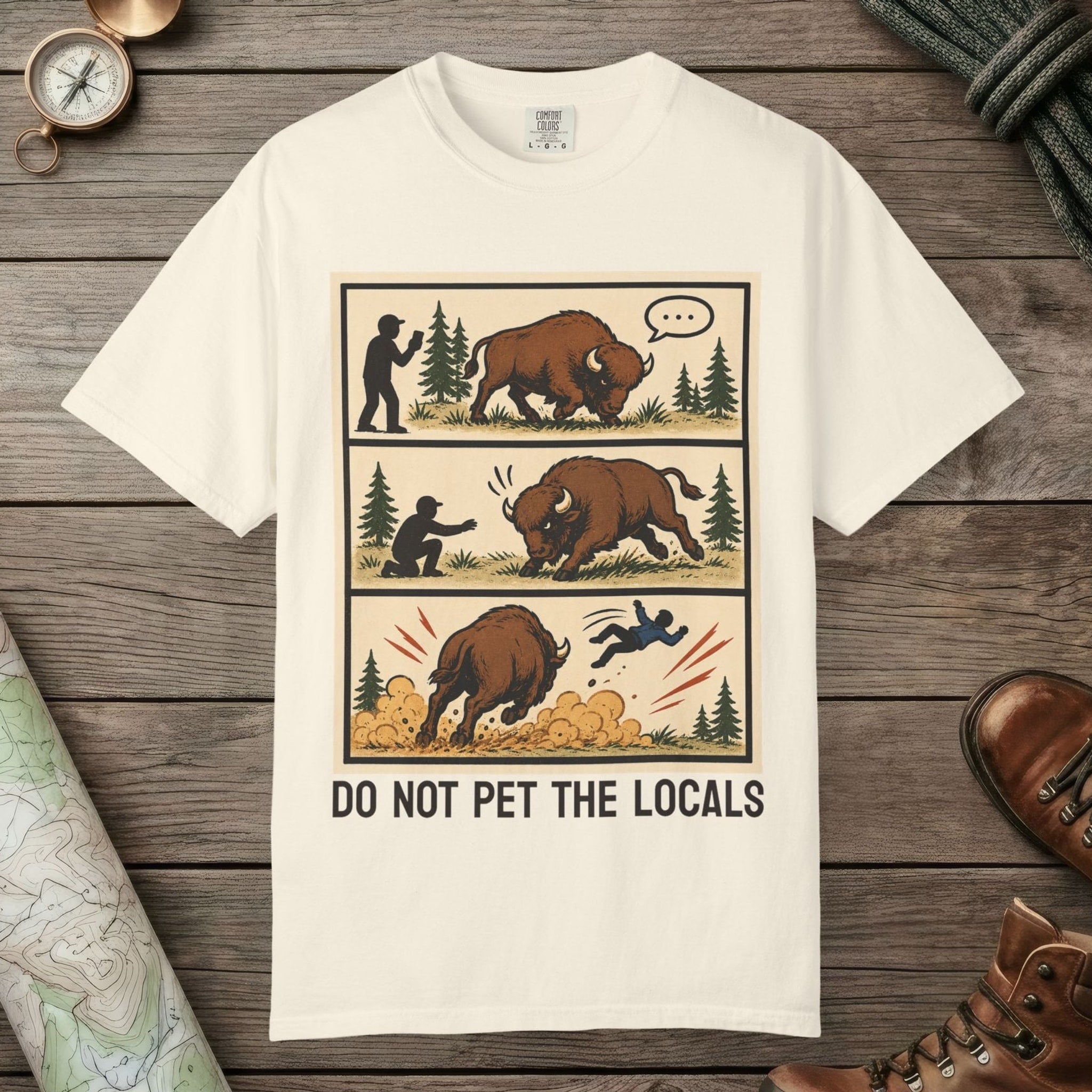 Ivory color unisex graphic t-shirt with "Bison Attack Comic" design