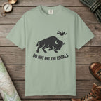 Bay color unisex graphic t-shirt with "Bison Attack" design