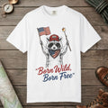White color unisex graphic t-shirt with "Born Wild Raccoon" design