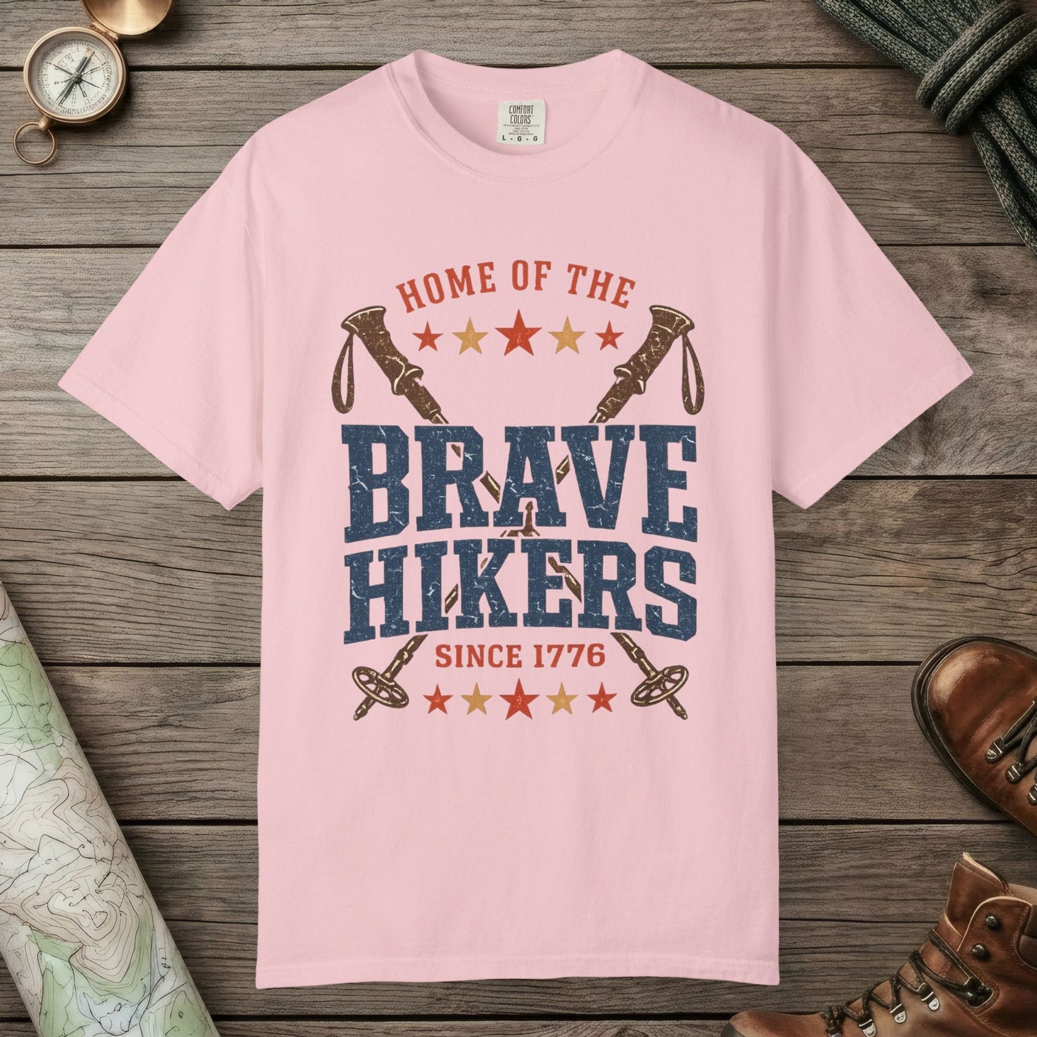 Blossom color unisex graphic t-shirt with "Brave Hikers" design