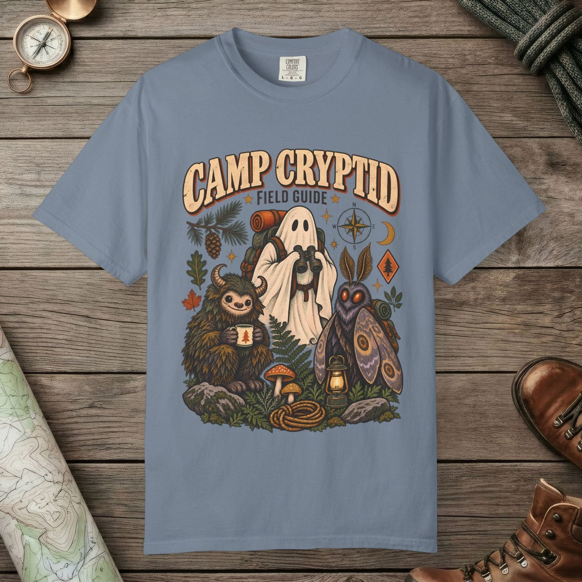 Blue Jean color unisex graphic t-shirt with "Camp Cryptid" design