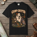Black color unisex graphic t-shirt with "Camp Cryptid" design