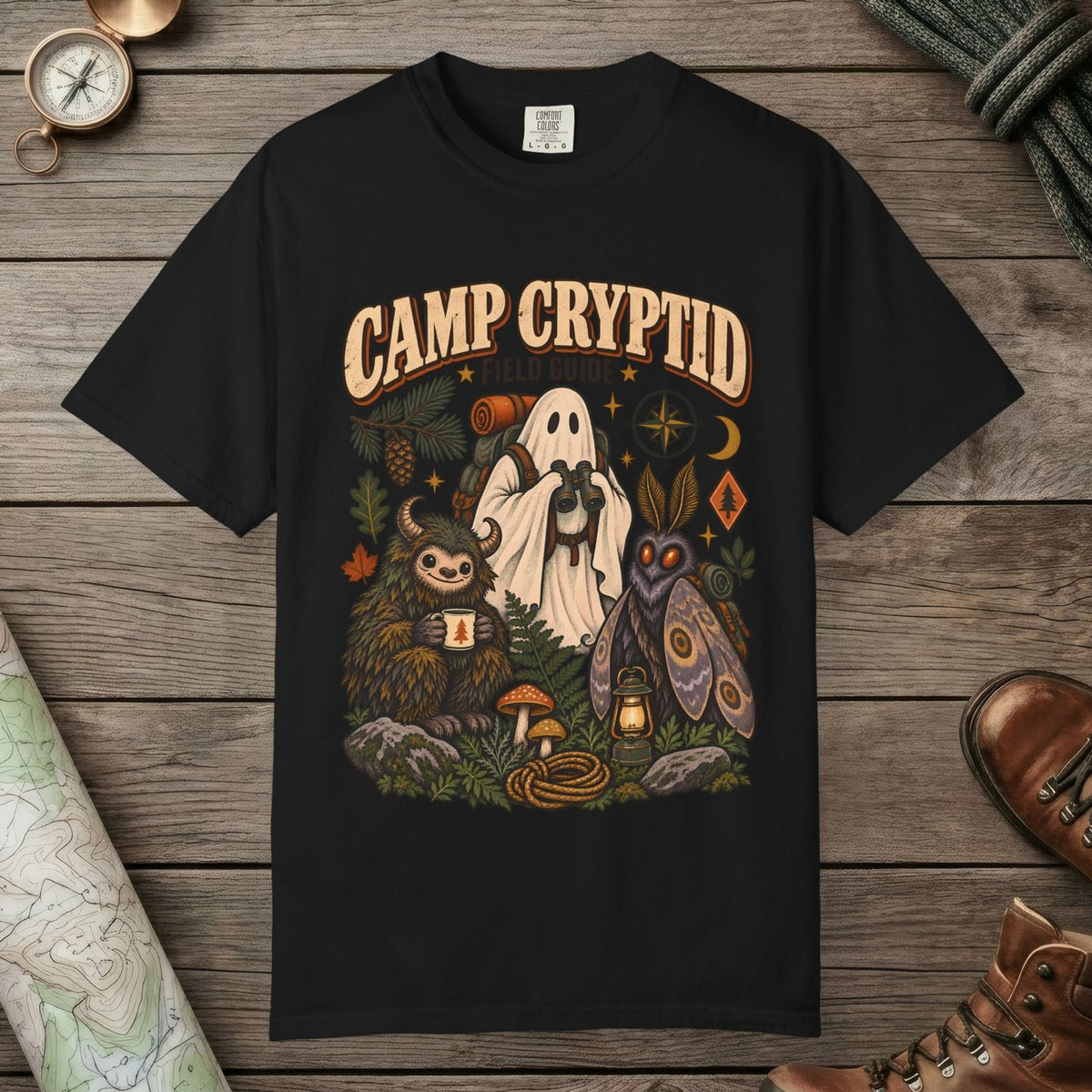 Black color unisex graphic t-shirt with "Camp Cryptid" design