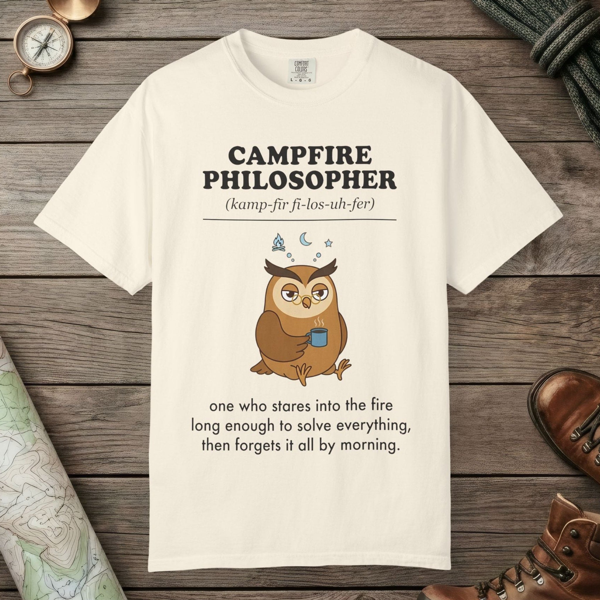 Ivory color unisex graphic t-shirt with "Campfire Philosopher Definition" design