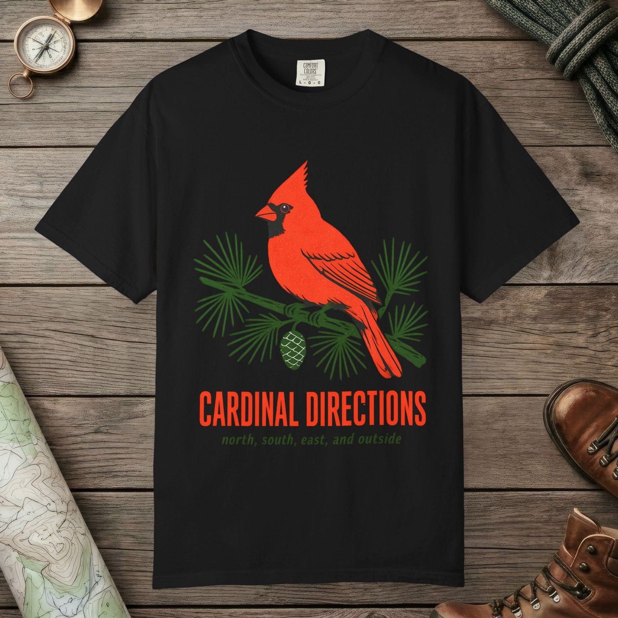 Black color unisex graphic t-shirt with "Cardinal on Pine" design