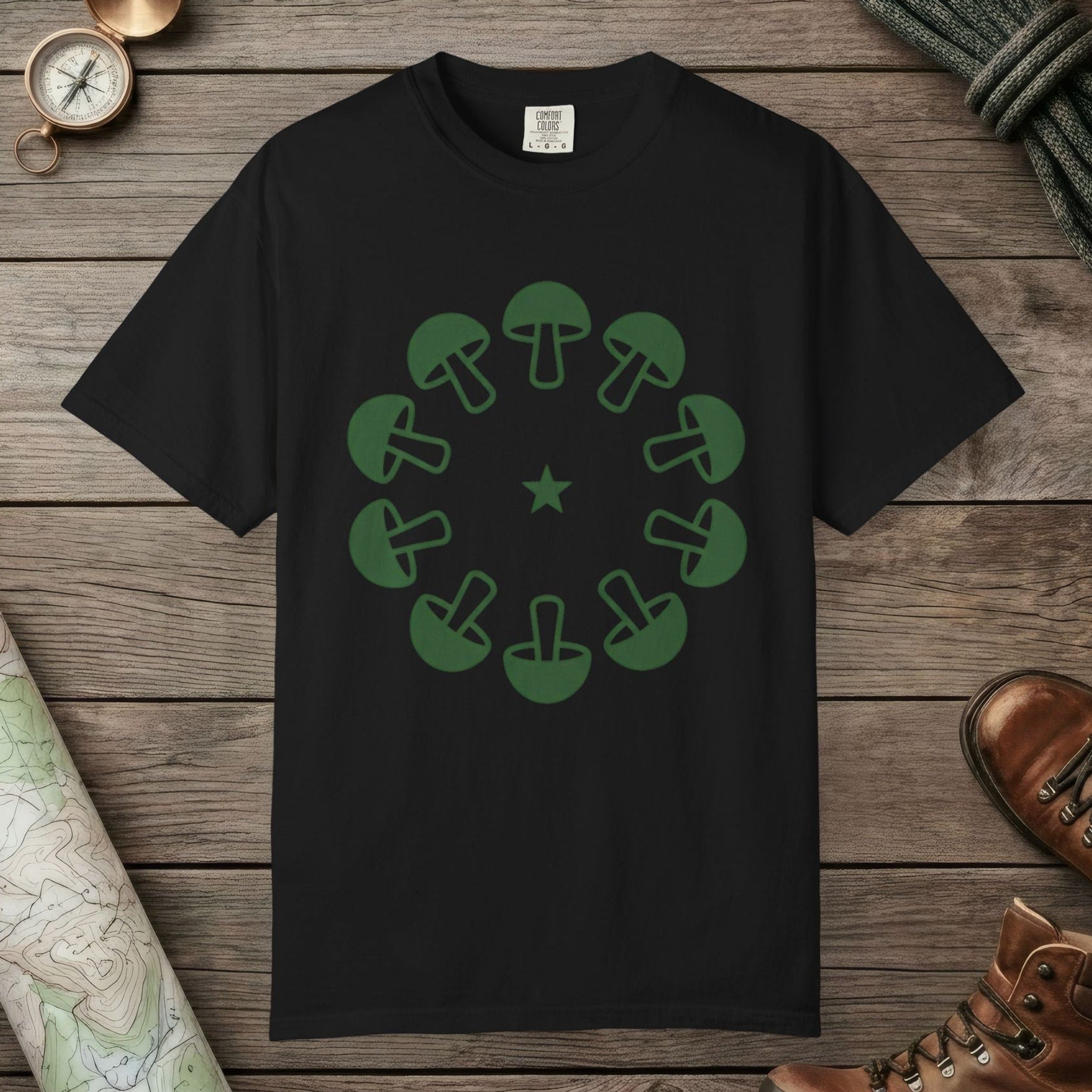 Black color unisex graphic t-shirt with "Celestial Mushroom Ring" design