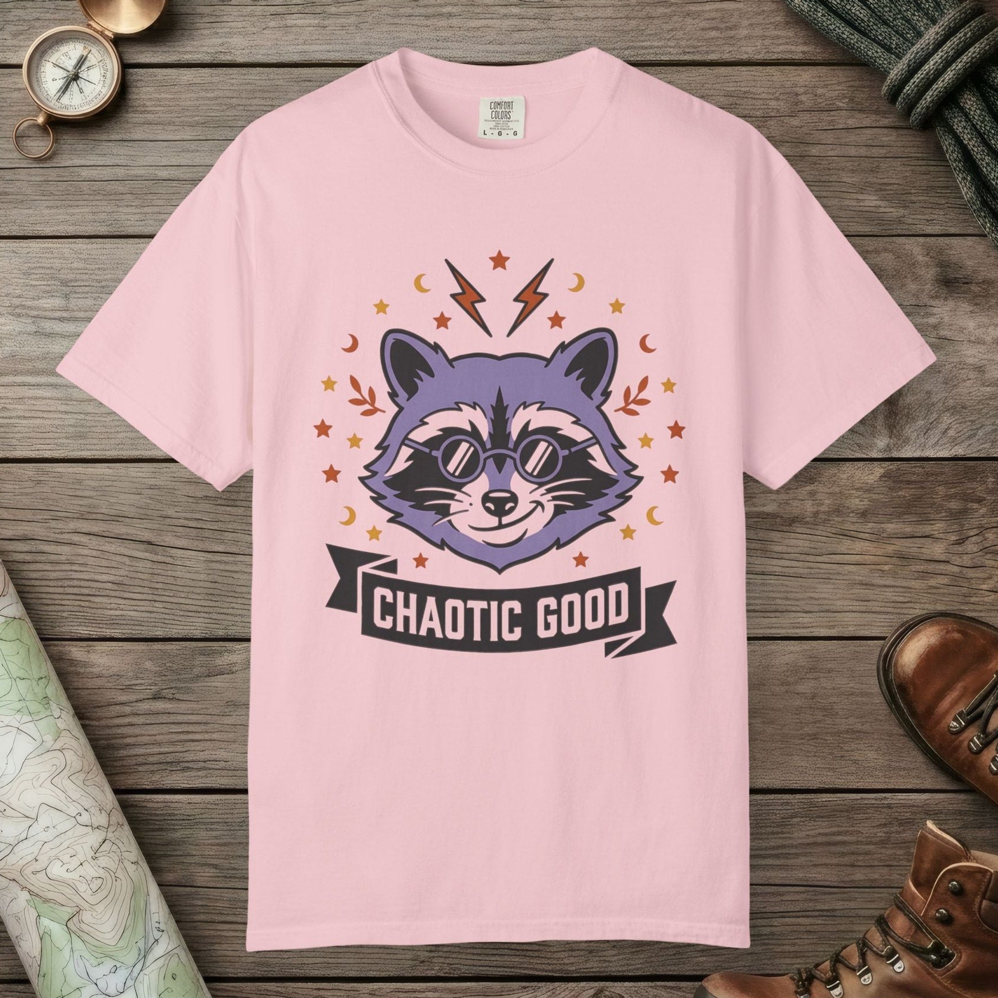 Blossom color unisex graphic t-shirt with "Chaotic Good Raccoon" design