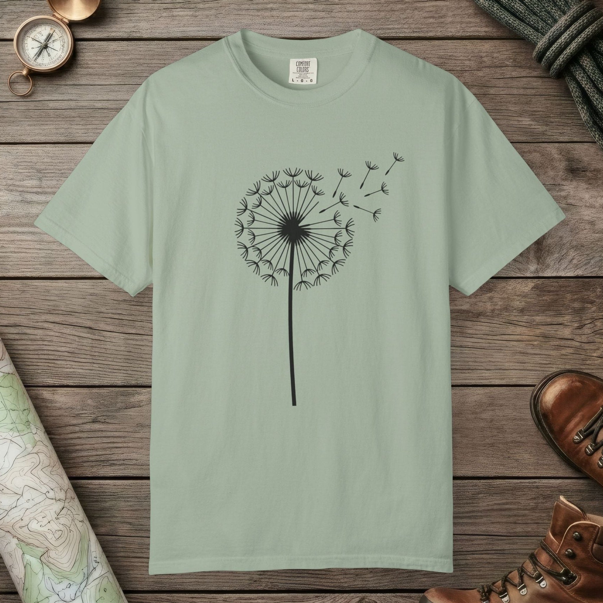 Bay color unisex graphic t-shirt with "Dandelion Wish" design
