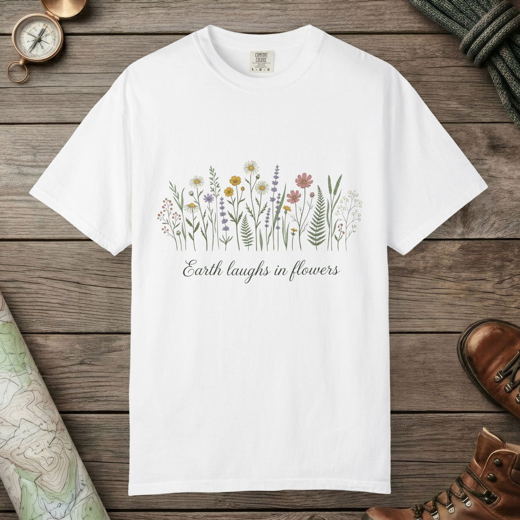 White color unisex graphic t-shirt with "Earth Laughs In Flowers" design