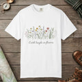 White color unisex graphic t-shirt with "Earth Laughs In Flowers" design