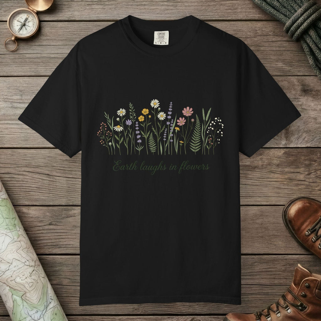 Black color unisex graphic t-shirt with "Earth Laughs In Flowers" design