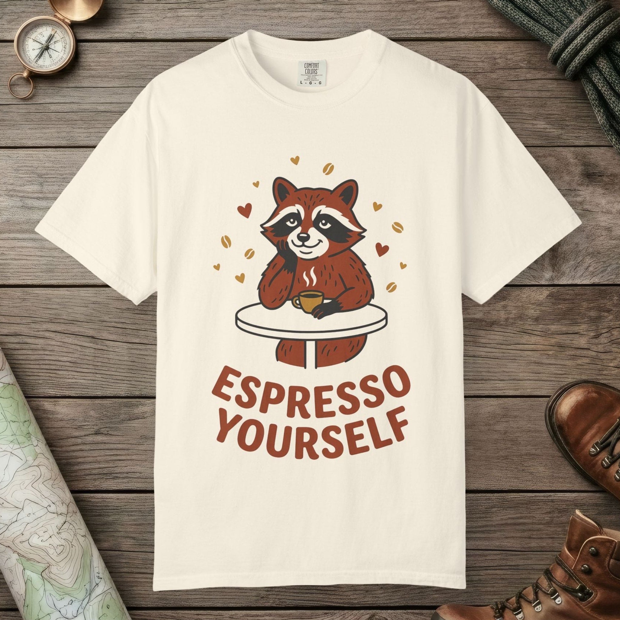 Ivory color unisex graphic t-shirt with "Espresso Yourself, Raccoon" design