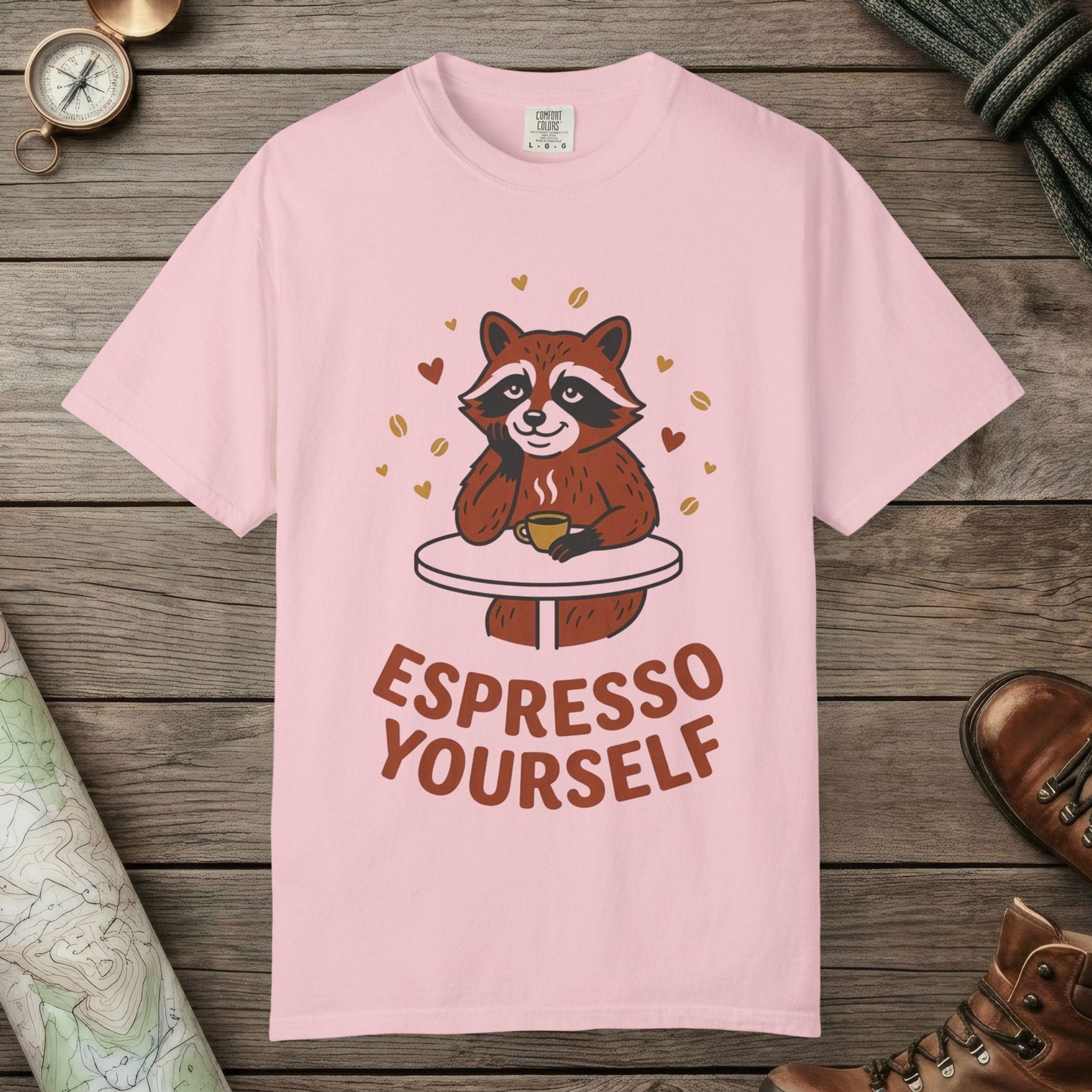 Blossom color unisex graphic t-shirt with "Espresso Yourself, Raccoon" design