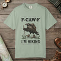 Bay color unisex graphic t-shirt with "F-Caw-F I'm Hiking" design