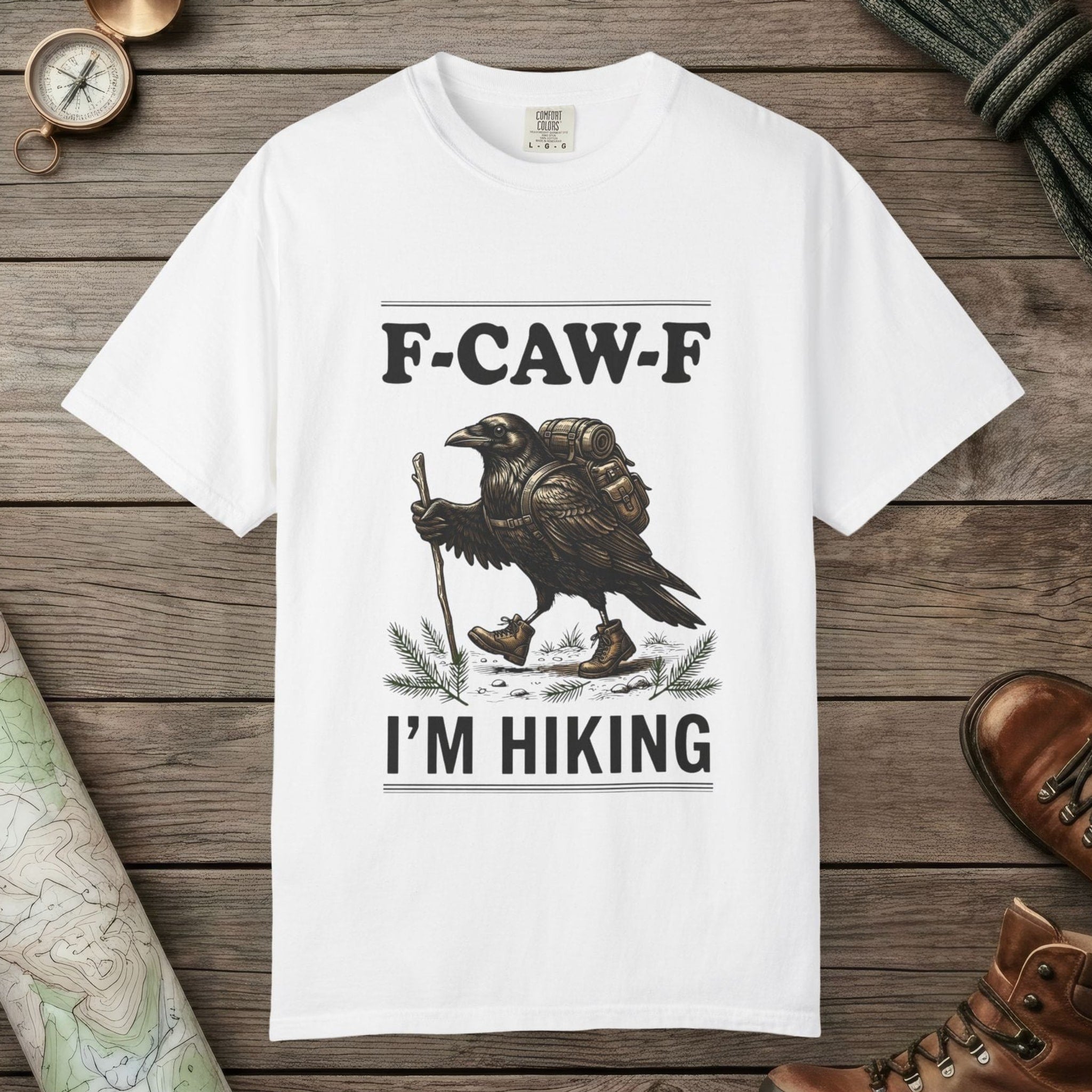 White color unisex graphic t-shirt with "F-Caw-F I'm Hiking" design