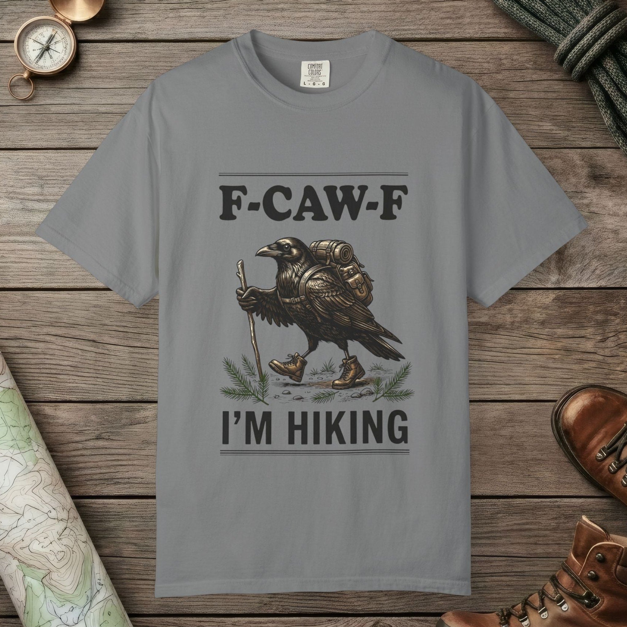 Grey color unisex graphic t-shirt with "F-Caw-F I'm Hiking" design