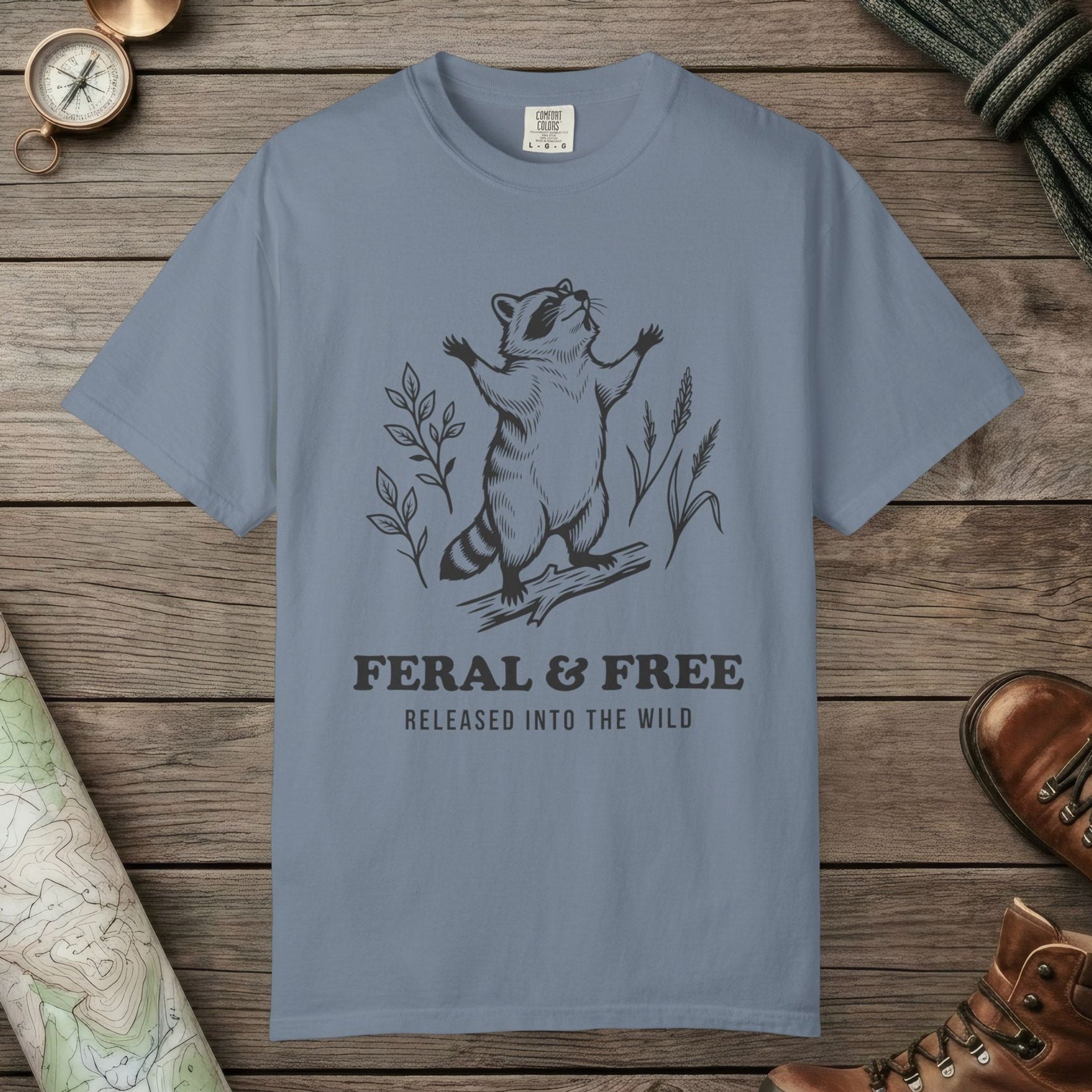 Blue Jean color unisex graphic t-shirt with "Feral & Free" design