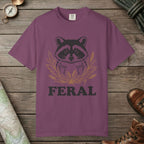 Berry color unisex graphic t-shirt with "Feral Raccoon" design