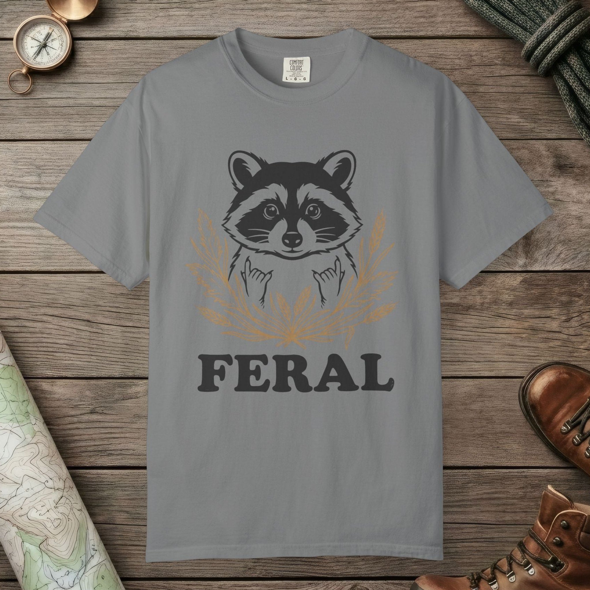 Grey color unisex graphic t-shirt with "Feral Raccoon" design
