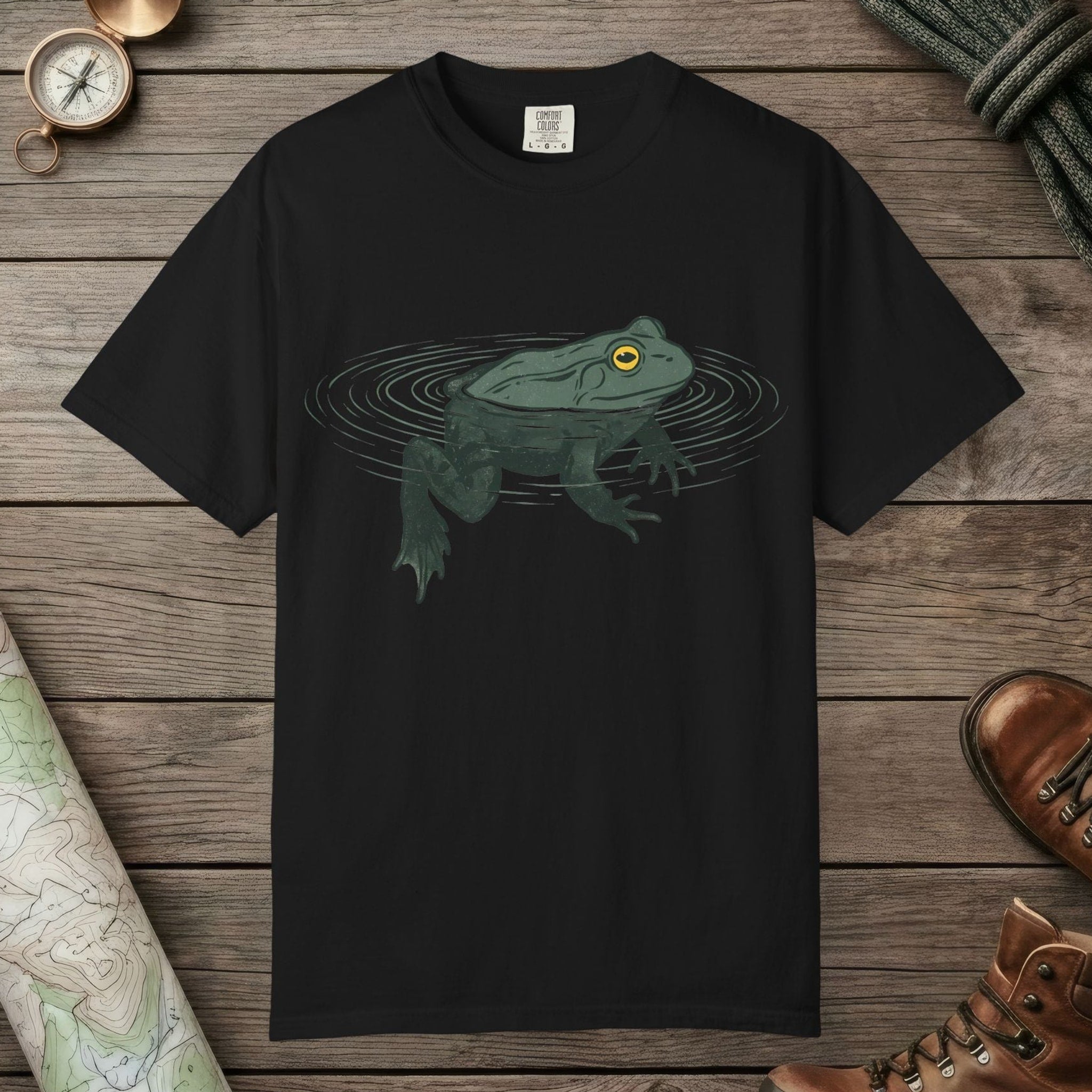 Black color unisex graphic t-shirt with "Floating Frog" design