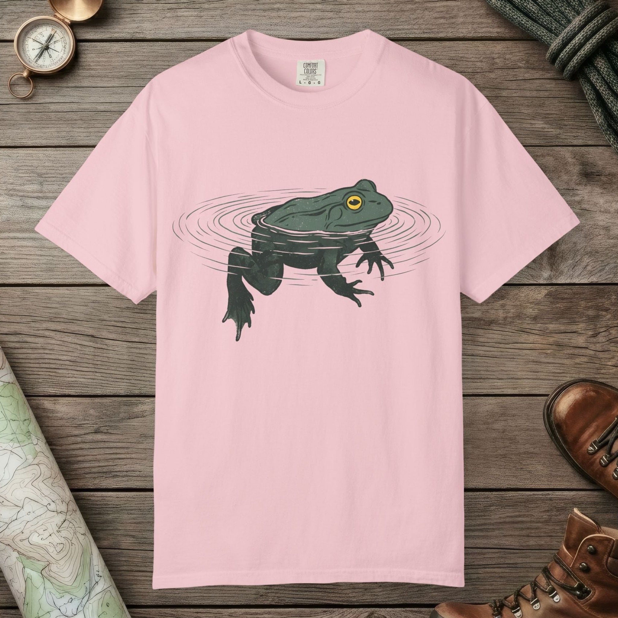 Blossom color unisex graphic t-shirt with "Floating Frog" design